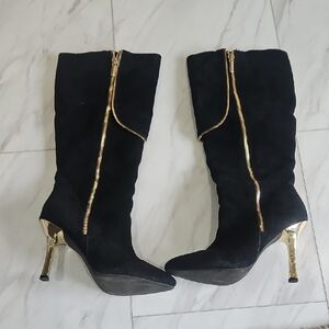 mark. Black and Gold Heeled Boots